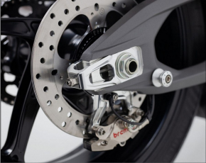 MotoCorse Pair of chain tensioner sliders with OEM Brembo 84mm rear brake caliper support - Ducati Panigale V4 2025