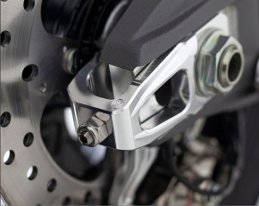 MotoCorse Pair of chain tensioner sliders with OEM Brembo 84mm rear brake caliper support - Ducati Panigale V4 2025
