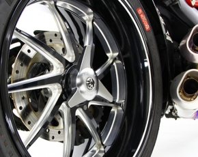 Moto Corse swingarm protection spinner design